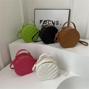 Sacs à bandouliers mode Small Round Sac Trend Femmes Simple Casual Coréen Version coréenne Couleur Sigle à main Pu Cuir à glissière