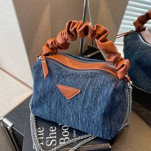 Schoudertassen Hoeden Emmer Hoeden Modieuze populaire denim handtas voor dames 2023 nieuwe vintage messenger bag luxe designer schoudertasqwertyui879