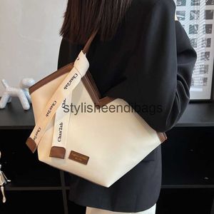 Sacs à bandoulière Sac à dos de grande capacité pour femmes 2022 Nouveau style Sac à dos de classe populaire Sac fourre-tout tendance cette année H240401