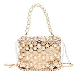 Schoudertassen Holle Parel Water Diamant Vogelkooitas Diner Internet Rode en westerse stijl Handketting Crossbody 2024 Nieuwe eenpersoonskamer 240427