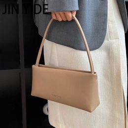 Schoudertassen Jin yide schouder crossbody tassen voor vrouwen 2023 lente neigen vrouwelijke vaste kleur eenvoudige handtassen en portemonnee twee riemen kantoortas
