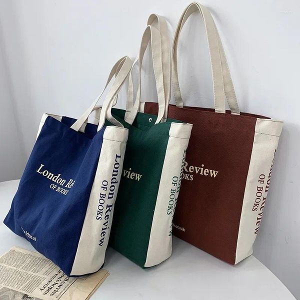 Bolsas de hombro Carta de gran capacidad Una bolsa de asas de lona Estilo universitario Estudiantes masculinos y femeninos que viajan Libro de mano