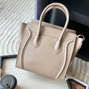 Schoudertassen Luxe draagtas Klassieke handtas Winkelen Ontwerpers Tassen Echt leer Glimlachgezichtstas Trapeze Crossbodytas Twee maten voor uw optie