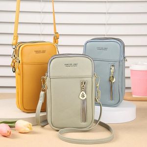 Schoudertassen mobiele telefoon tas dames messenger hangende nek munt portemonnee verticale handtas all-match mini klein crossbody