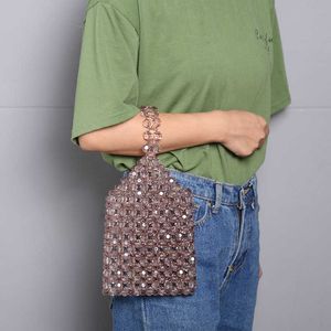 Sacs à bandoulière nouveau sac perlé femmes sac à main en cristal solide coréen Mini mode téléphone portable 240427