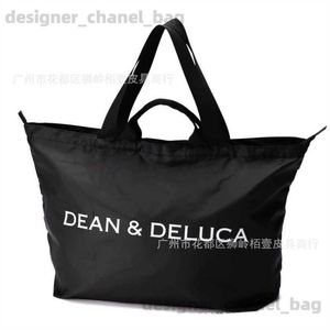 Schoudertassen Nieuwe Japanse Dean Deluca Black opberg bagagetas met grote capaciteit buitenkleedbare één schouderhandtas T240416
