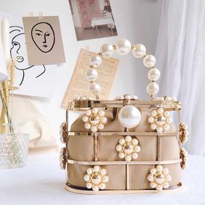 Sacs à bandoulière Pearl Basket Soirée Pochette Femmes Célèbre Marque Évider Fleurs Perlée Métallique Bourse Coréenne Seau Sac À Main Partie 230426