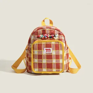 Sacs à bandoulirs Plaid Fashion Backpacks Femme Femme sacs à main de créateur de luxe Racs 2024 dans des perles de polyester décoration de lettres de petit tissu