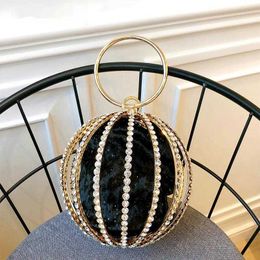 Schoudertassen Rhinestone Sferical Cage Evening Copput Bag Women Hollow Out Bling Alloy Dinner Purse en Handbag Ladies Round Metal Handle Nieuw 230426