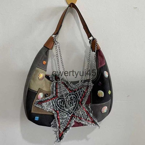 Sacs à bandoulière Rock alf Moon Sacs Femmes Designer de luxe et sacs et sac à main 2024 Nouveau en toile broderie Star Leers Aisselles Cains Soulderqwertyui45