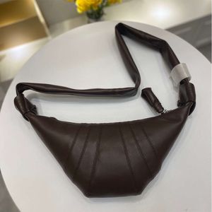 Bolsos de hombro pequeños y populares moño de cuerno de buey de cuero genuino para mujer, bola de masa de pecho suave, bastón cruzado individual