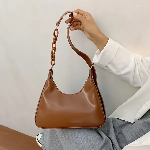 Bolsas para el hombro El diseño de nicho es una bolsa de axila simple y elegante, una pequeña para mujeres, baguette 2024