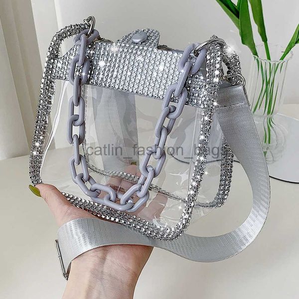 Bolsos de hombro Bolso transparente de PVC con cadena gruesa de río para mujer Bolso de hombro de gel para ropa personalizada de veranocatlin_fashion_bags