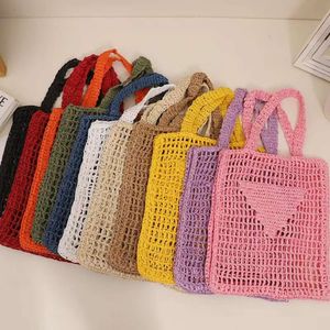 Schouder designer tas dames strandtassen handtassen mode mesh holle geweven winkelen voor zomerstro -draagtas 6colors dicky0750 s