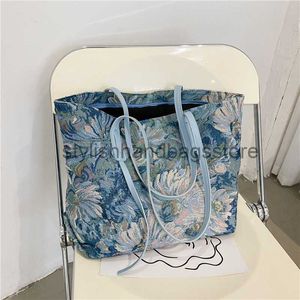 Schouder Getextureerd Handheld met hoge capaciteit 2023 Koreaanse editie Olieverfschilderij Graffiti Emmer Etnische stijl Tote Tidestylishhandbagsstorestylishhandbagsstore