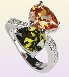 Shunxunze Big S Anneaux de mariage Bijoux pour femmes Rose Red Péridot Morganite Bleu jaune violet cubique Zirconia Rhodium 9450361