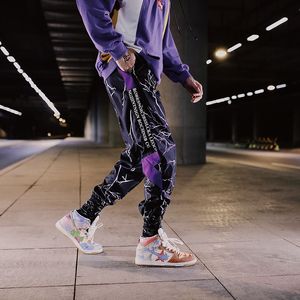Côté rayure piste survêtement pantalon hommes 2020 étiquette réfléchissante piste sarouel Homme Streetwear mâle HipHop