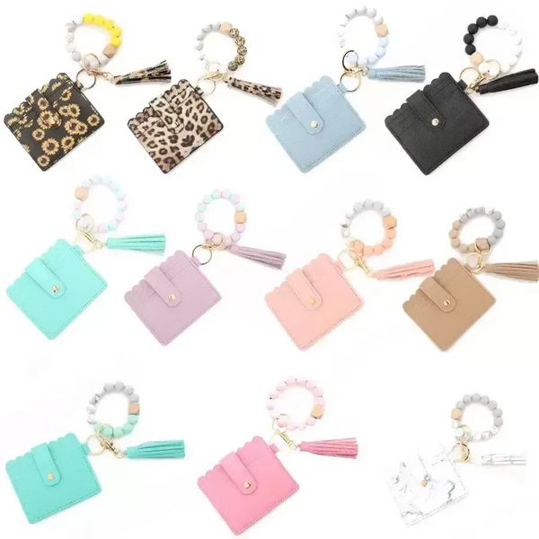 Pulsera de cuentas de silicona Favor Bolsa de tarjeta de leopardo Cuentas de madera Cuero de la PU Borla Llavero Cartera portátil para mujer con Snap sxaug01