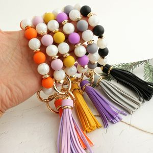 Bracelet de perles en Silicone, pendentif à frange, perles en bois Anti-perte, porte-clés de poignet pour femmes, 13 couleurs, vente en gros