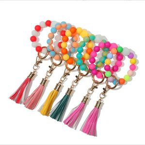 Siliconen Bead Bracelet Party Befeuille fluorescerende pols sleutels Tassel Key Chain Glow in de donkere vrouwelijke hangende polsband Keychain Polsles Holder BC409-2