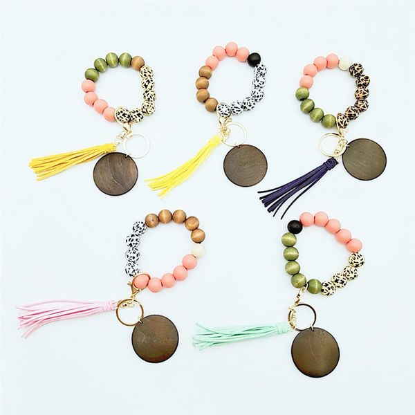 Bracelet porte-clés en silicone pour femmes, bracelet perlé, porte-clés de maison, de voiture, avec pompon, accessoires de porte-clés en perles de bois, multicolore, vente en gros