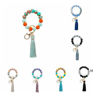 Porte-clés de poignet en Silicone, multi-styles de fête de qualité alimentaire, Bracelet à pompon à franges en PU, porte-clés, expédition maritime JNC08