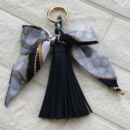 Zijdeachtige sjaal sleutelhanger kunstleer kwastjes sleutelhanger dagelijks mode cadeau mooie handtas charme rugzak hangende portemonnee hanger257t