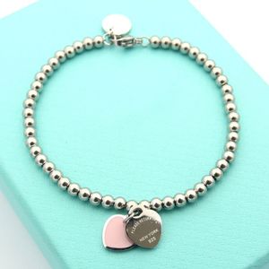 Silver Color Women Designer Bangles Double Heart Pendant Perge de luxe en acier inoxydable Bracelet Cœur 312V