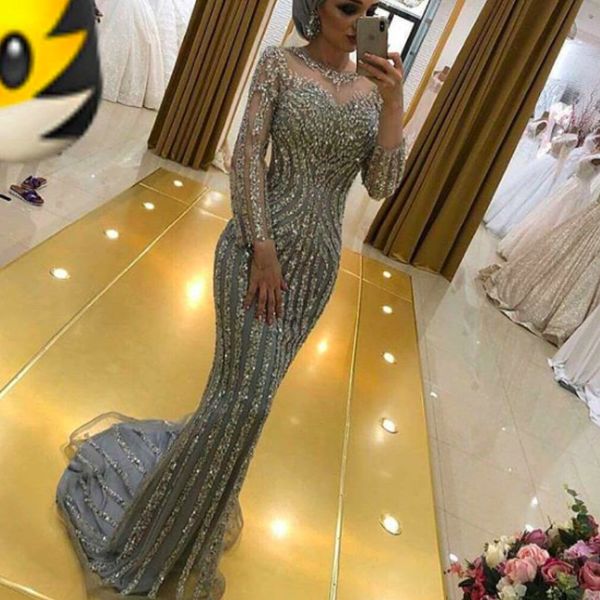 Vestidos de noche de sirena de manga larga de plata 2018 Patrón de cuello transparente con cuentas de alfombra roja Celebrity Prom Dress Vestidos de fiesta formal de cristal de lujo