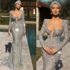 Zilveren lovertjes Mermaid Prom Dress Sexy Deep V-hals met lange mouwen Crystal Pailletten Avondjurken Sweep Train Pageant Towns