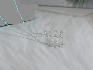 Collier de concepteur en argent de couronne simple