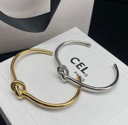 Eenvoudige designer knoopt bangle polsband manchet voor vrouwen mode goud sier armband sieraden hoogwaardige bruiloftsliefhebbers cadeau 2024