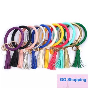 Pulsera de cuero simple Llavero PU Muñeca Llavero Borla Colgante Pulseras Llavero deportivo Pulseras Brazalete Anillos redondos Favor de fiesta