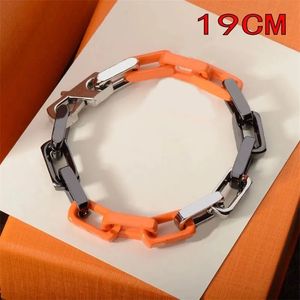 Chaîne à maillons simple plaqué argent collier de créateur pour les femmes fête créative spéciale bijoux de luxe en acier inoxydable hiphop orange noir amour bracelet chic ZB005 E23