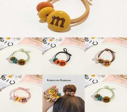 Eenvoudige M Bean Rope Spring Hoofdband Candy Color Circle Cute Rubble Band Haarhoofden Women039S Nieuwe stijl 20218904918