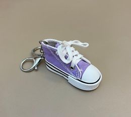 Eenvoudige motorfiets -zijsteun Keychain Mini Canvas Simulatie Leisure Shoes Keychain -pakket Pendant Factory Groothandel