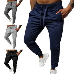 Pantalones de calado de cintura elástica de color sólido de color sólido