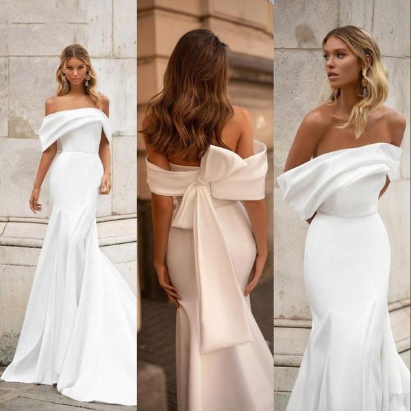 Vestido de novia de sirena de satén blanco simple Moderno fuera del hombro Arco Volver Vestidos de novia largos de trompeta Vestidos de novia elegantes magníficos por encargo Robe De Mariee