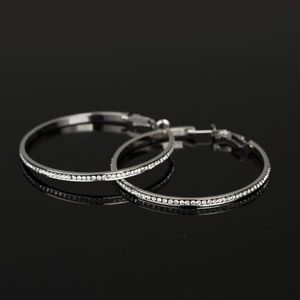 Boucles d'oreilles simples et pleines de diamants pour femmes Boucles d'oreilles populaires et créatives Auriculaires de qualité supérieure Platine / Géométrie de gemme incrustée de platine