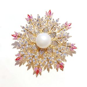 SINZRY 2019 circonita cúbica brillante elegante copo de nieve flor broches para vestido pin accesorio de joyería para mujer