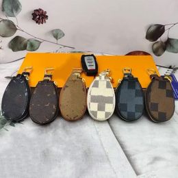 Six couleurs sacs en cuir véritable célèbre créateur de bijoux sac de rangement de clé de voiture pochette de porte-clés de mode pour charme hommes femmes avec boîte-cadeau originale louiselies vittonlies