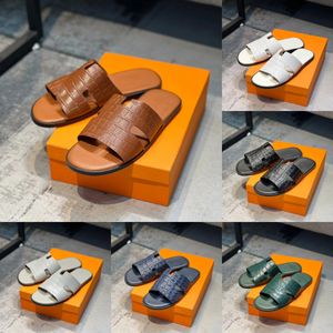 Zapatillas de diseñador Sandalias deslizantes Playa Sandalias planas clásicas Verano Hombres Zapatillas de espiga de cuero Mujeres Zapatos versátiles informales al aire libre