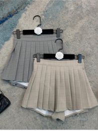 Jupes 2023 Automne College Girly Style Jupe plissée pour femmes douces tout-assorti rayé court culotte bottes
