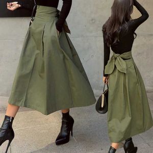 Jupes 2023 nouveau automne noir jupes femmes mode coréenne couleur unie grand Swing Fe jupe longue jupe sauvage taille haute nœud mince jupesL231212