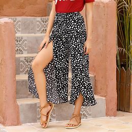 Faldas de verano 2023, estilo europeo y americano, pantalones de mujer para ir al trabajo, falda con abertura Irregular y estampado de leopardo para mujer