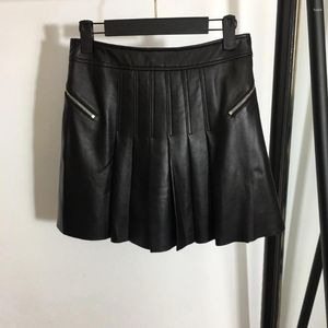 Jupes 2024 Automne / hiver en cuir véritable jupe en cuir haute taille A-line plissée de mode courte