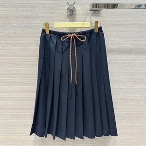 Jupes 2024 Fashion Summer Lace-up-Up Elastic haute taille plissée midi à la longueur de genoue femme Sweet Preppy Style Navy couleur