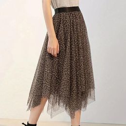 Jupes 2024 Été vendant du fil jupe de fils de la mode féminine fée léopard à demi-robe couche mi-longueur de mi-longueur irrégulière