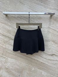 Rokken 24 Lente en zomer dames casual mode geplooide halve rok college stijl meisjes kleine rok wordt geleverd met veiligheidsbroek