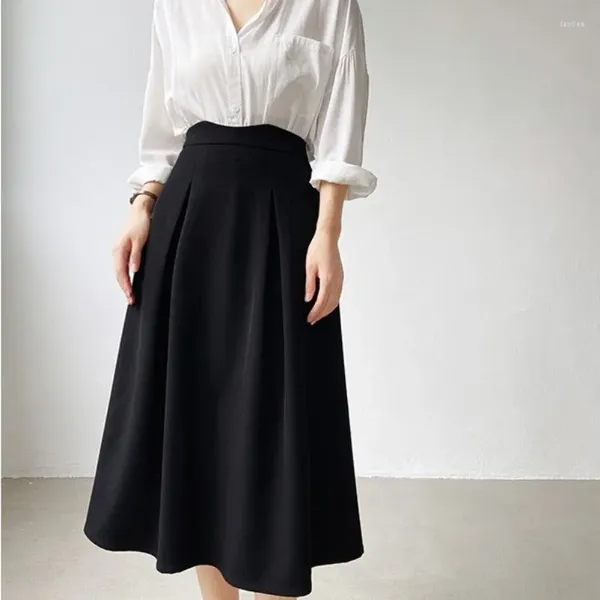 Faldas Falda negra de media longitud para mujer en primavera y verano con una sensación de gama alta, ajustada, minimalista, de cintura alta